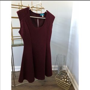 Maroon peplum quilted dress.